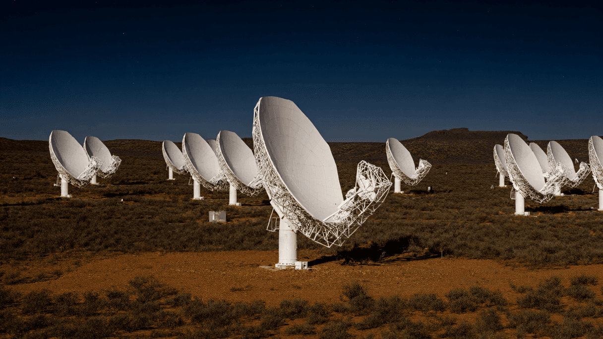 The Signal Game: High-Redshift Detections and the Hardware Moat
